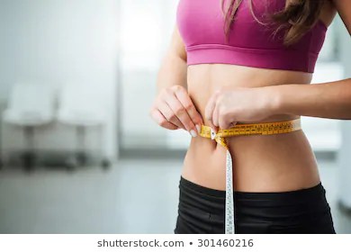 slim-young-woman-measuring-her-260nw-301460216